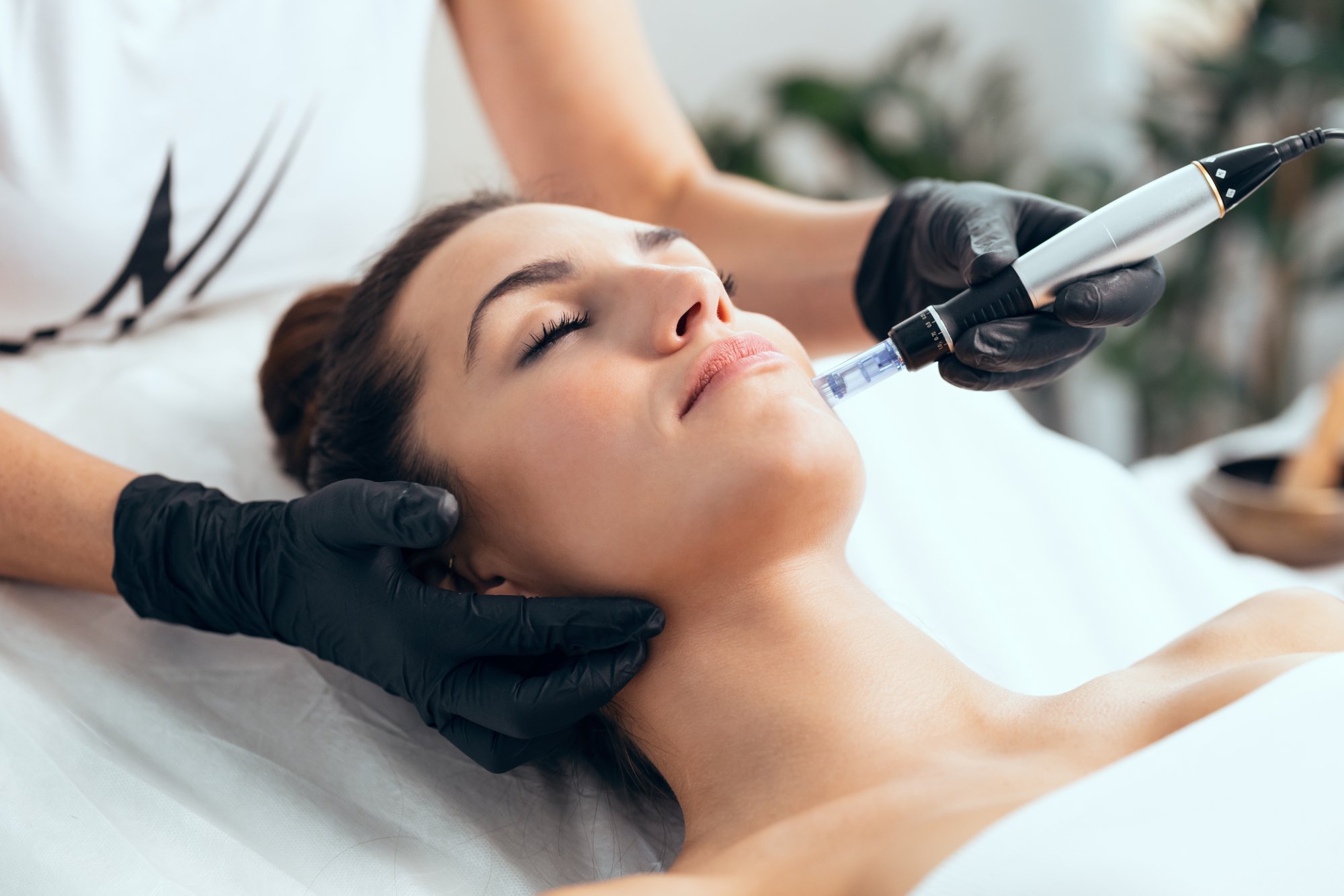 Women having aesthetics treatment in a garden room