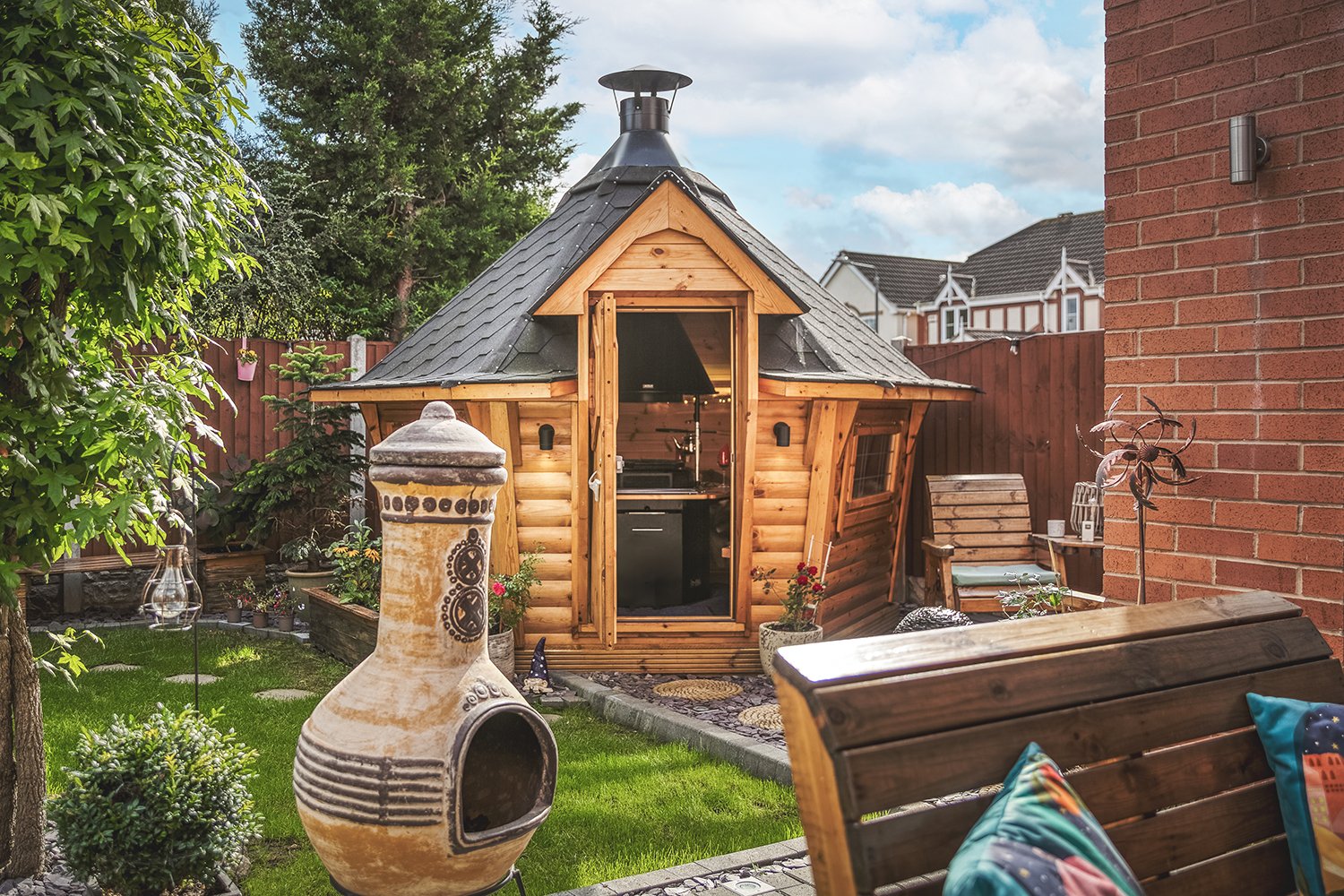 small grill cabin for the garden with chiminea at the front