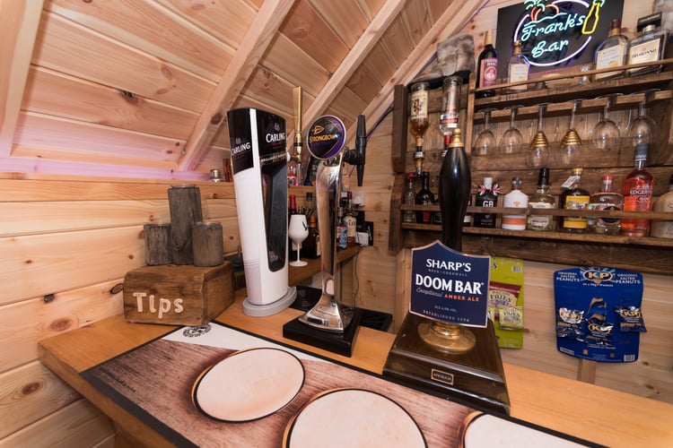 Inside a BBQ cabin garden bar