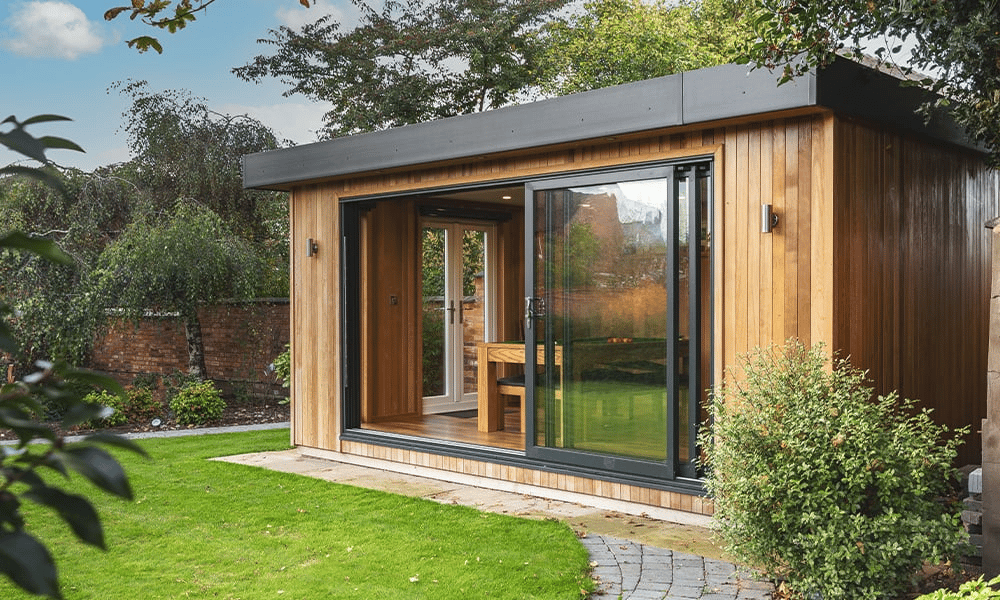 large bar garden room with patio pathway and grassy lawn area and large sliding glass doors with view of pool table