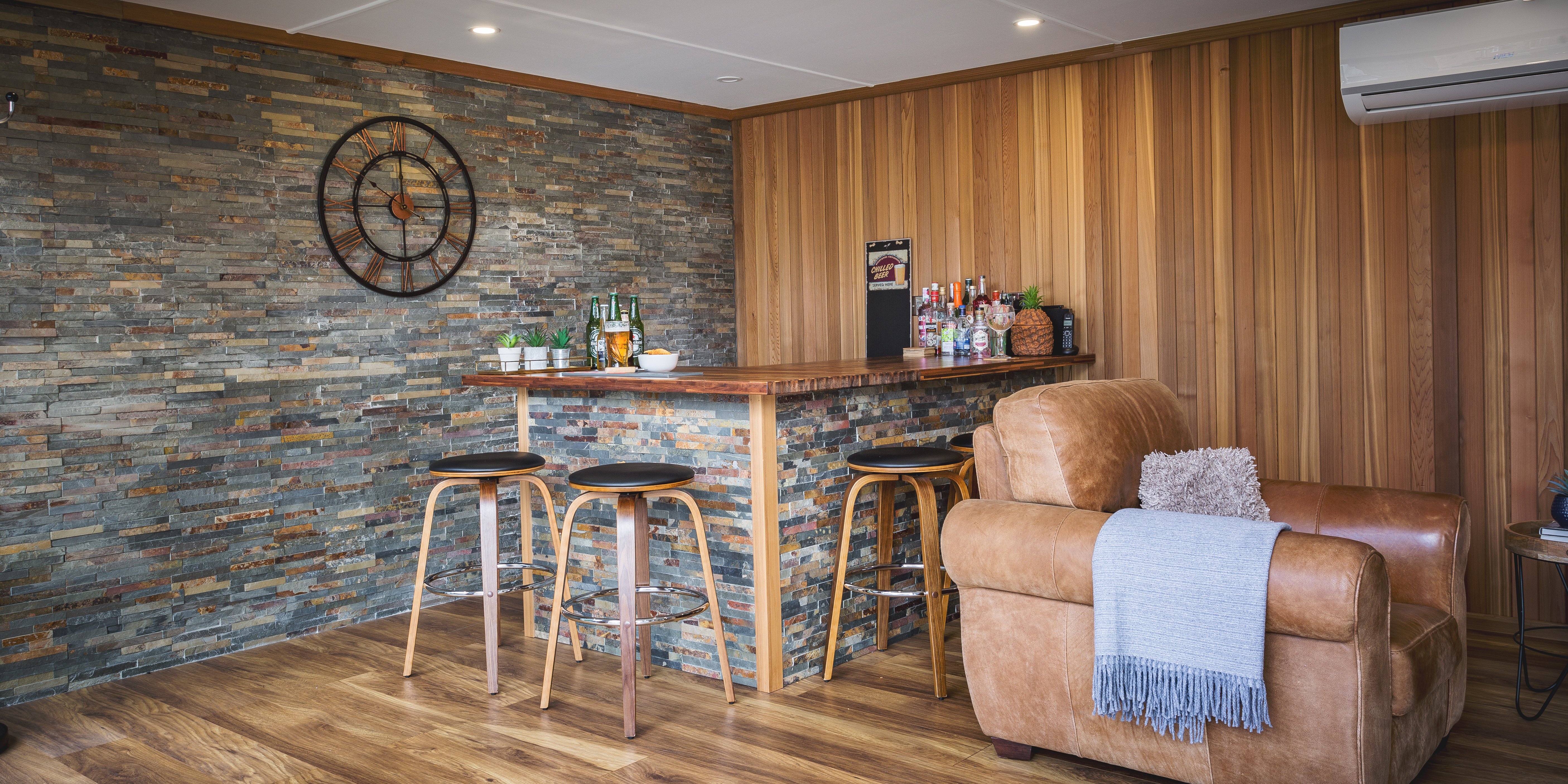 Inside garden bar with slate feature wall