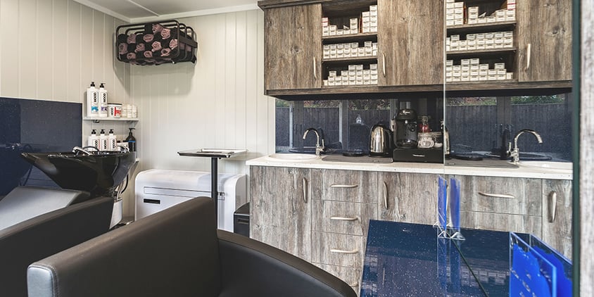 Interior of a garden hair salon with running water