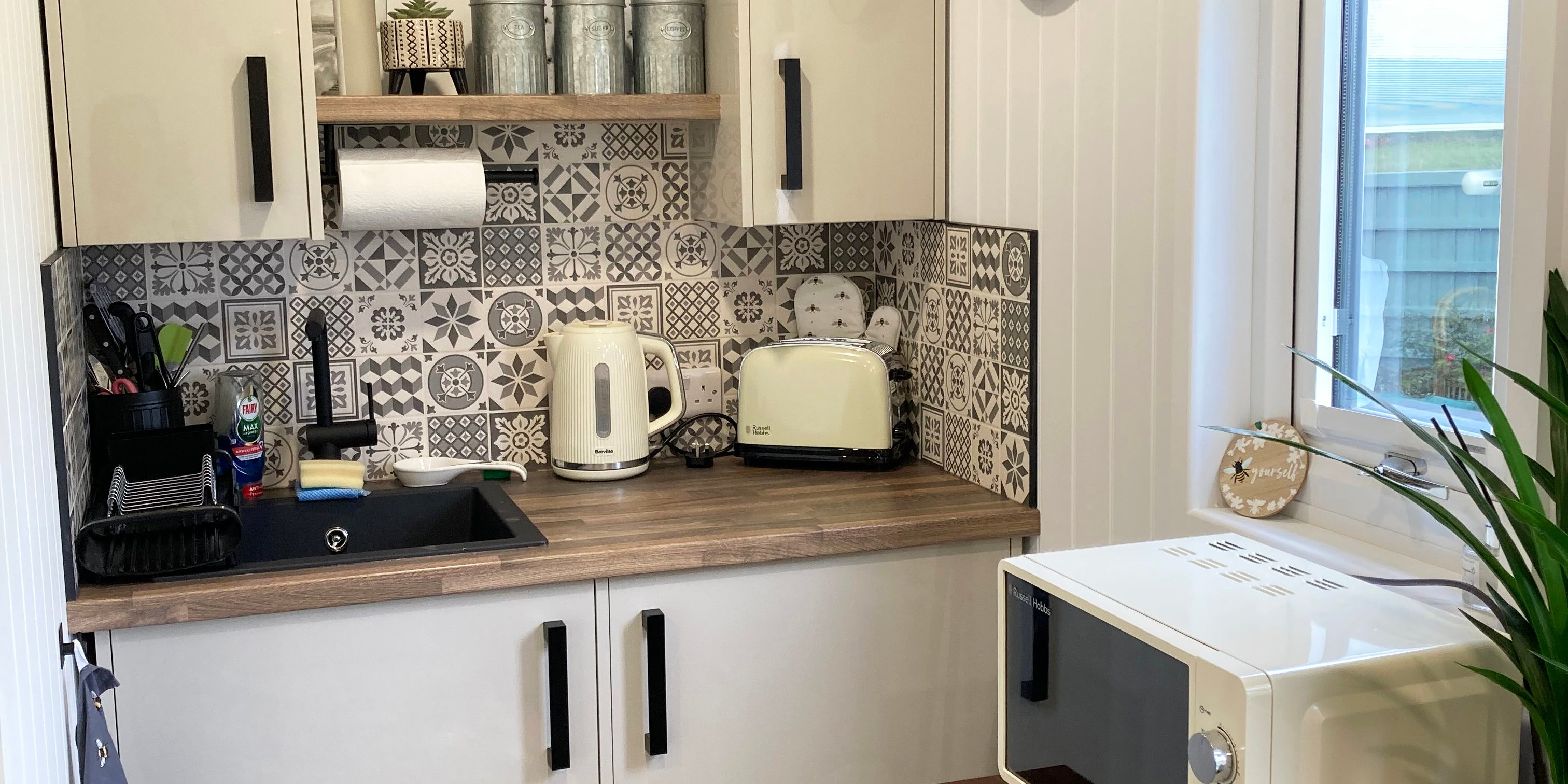 kitchenette area inside a garden room with full plumbing installed