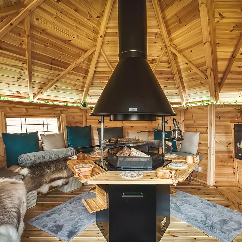 Interior of a scandinavian garden bar hut with bbq