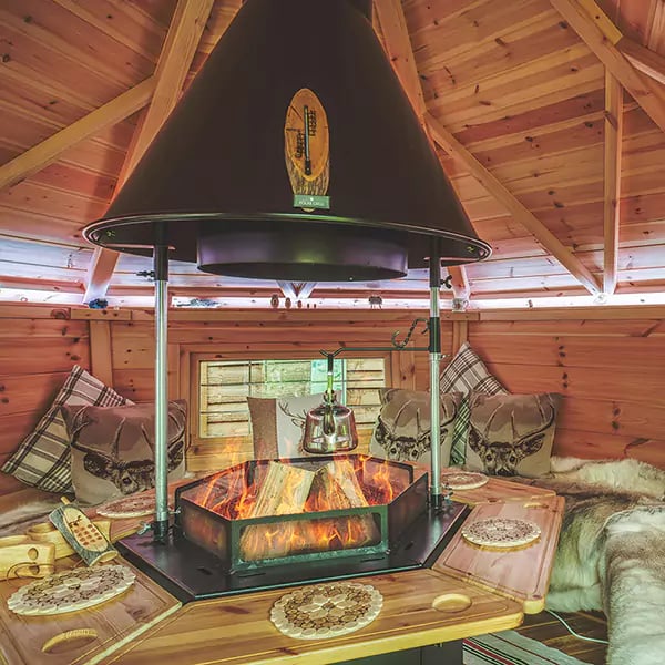 Interior of a BBQ hut grill house with roaring fire