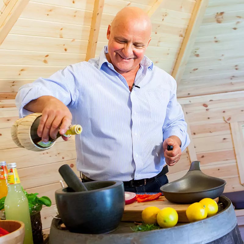 aldo zilli cooking inside an Arctic Cabin