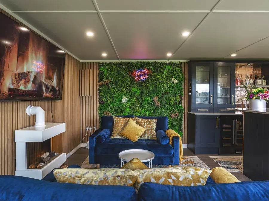 inside of a bar for garden with pant wall & neon sign