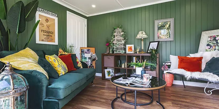 garden room snug with sofa and decorations garden rooms design ideas