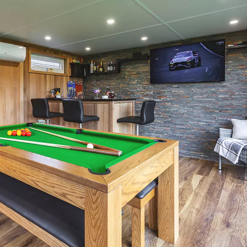 inside a garden bar with pool table