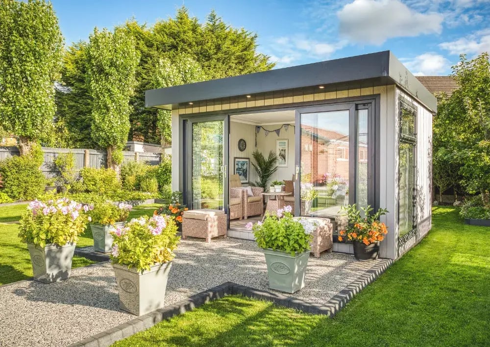 5m x 3m summerhouse in neat garden