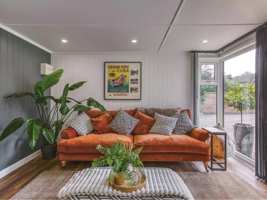garden with with rust orange sofa