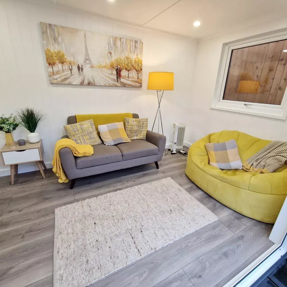 interior of a garden room with sofas