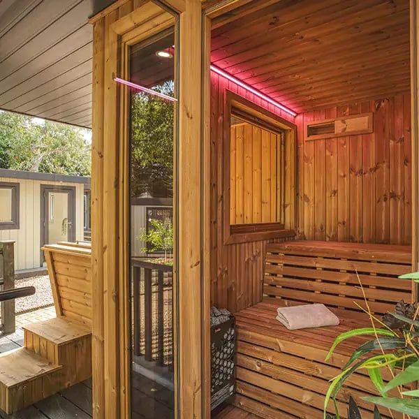 looking inside a garden sauna cabin with LED lights