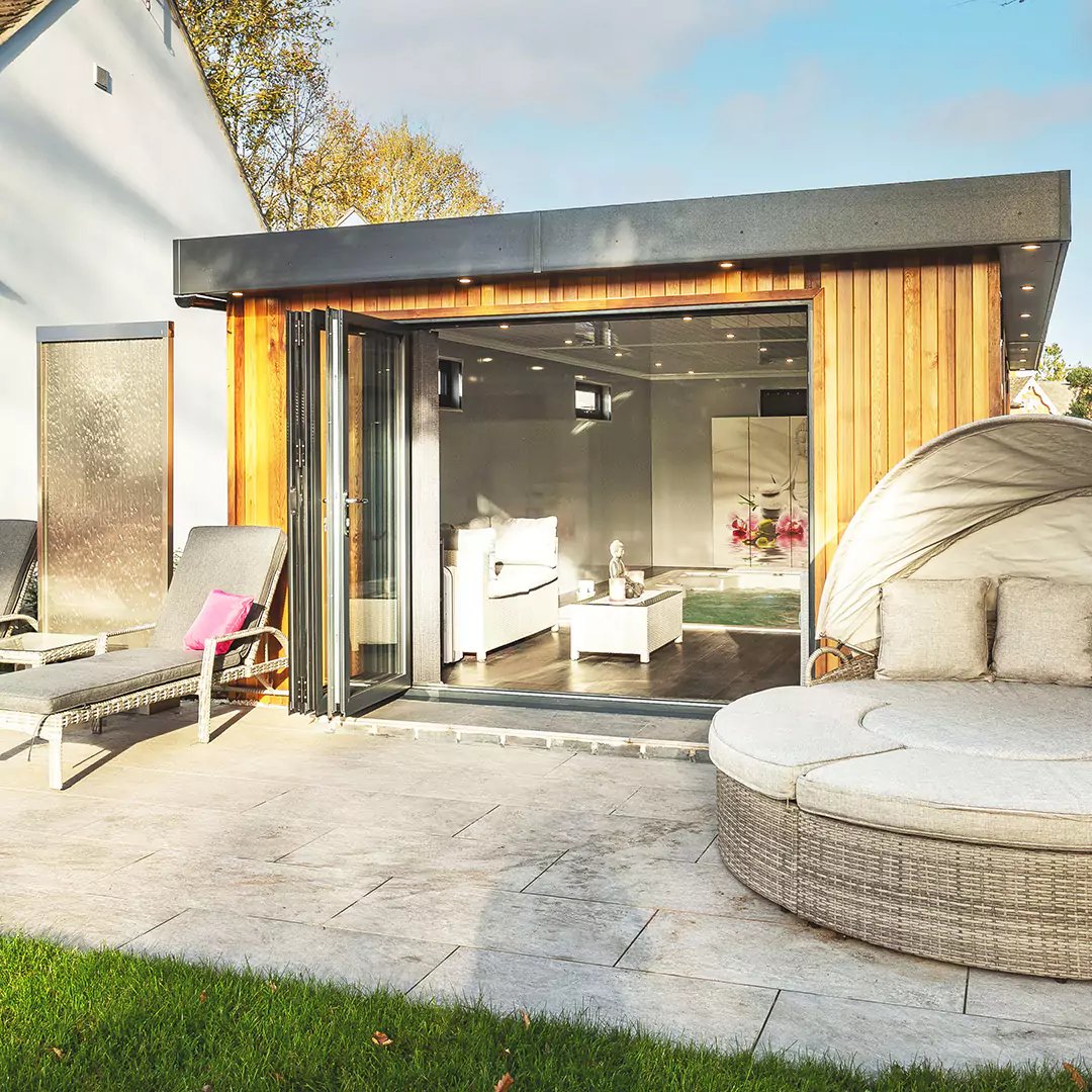 Garden swim spa room with open bifold doors