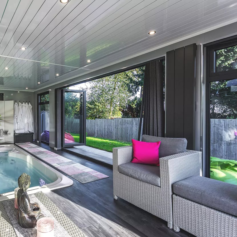 home spa in garden room with swim spa