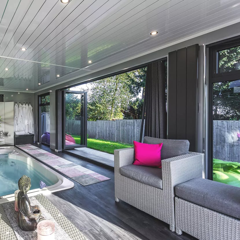 home spa in garden room with swim spa