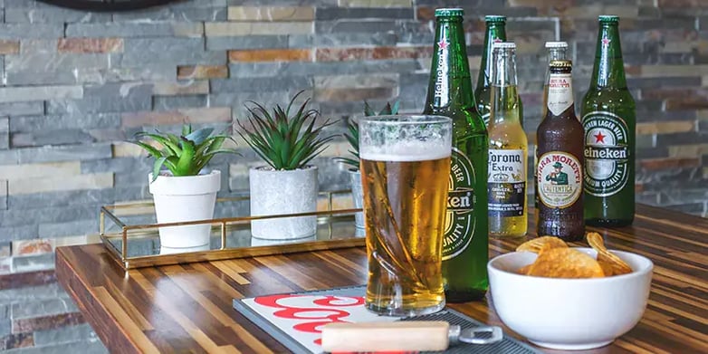 interior of a garden bar with beers and crisps