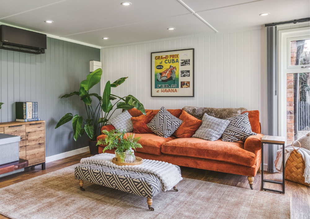 inside a 6 x 4 garden room with sofa