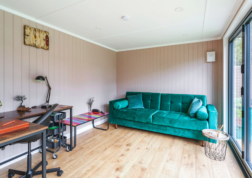 inside a 6 x 4 garden room with sofa