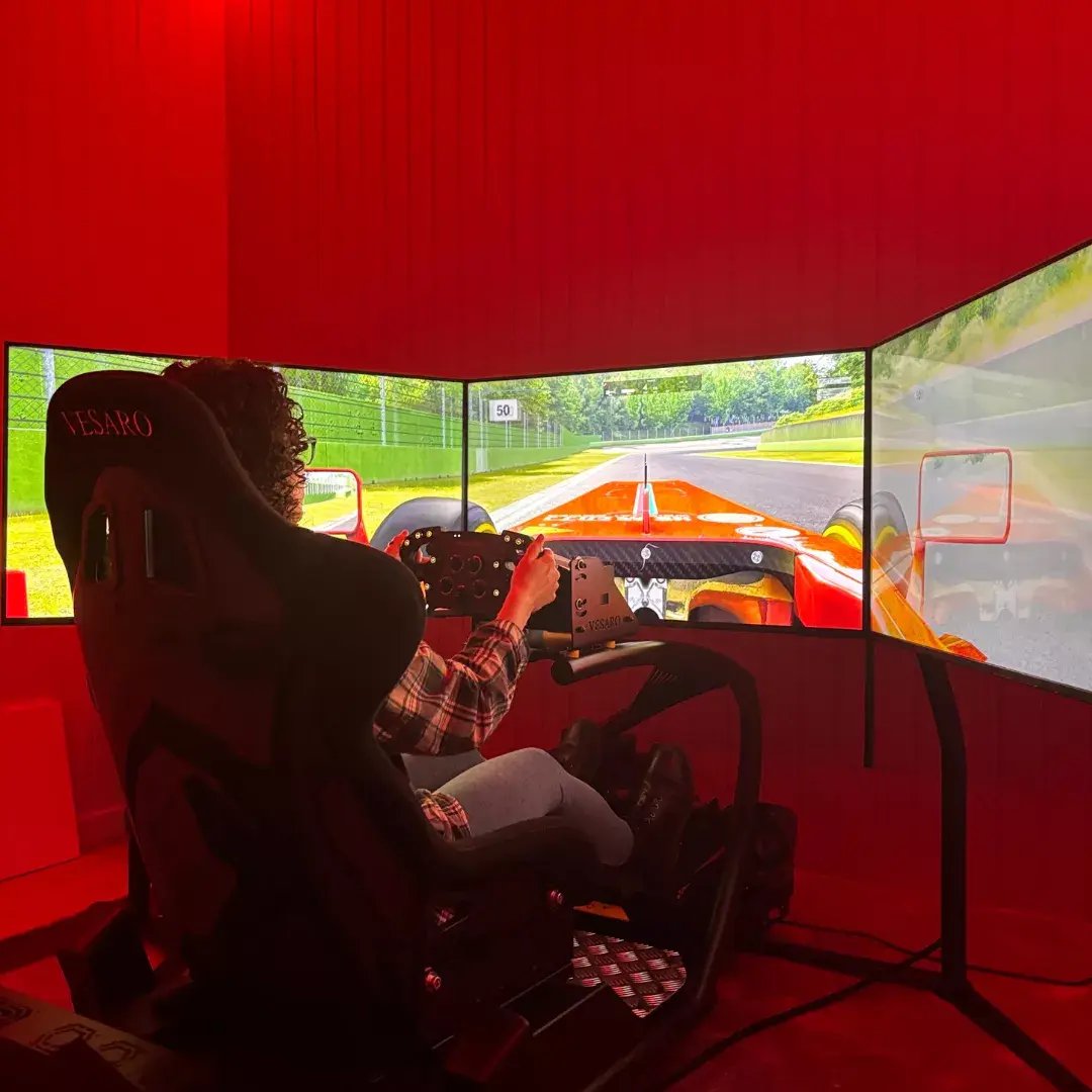 inside a driving sim cabin for the garden