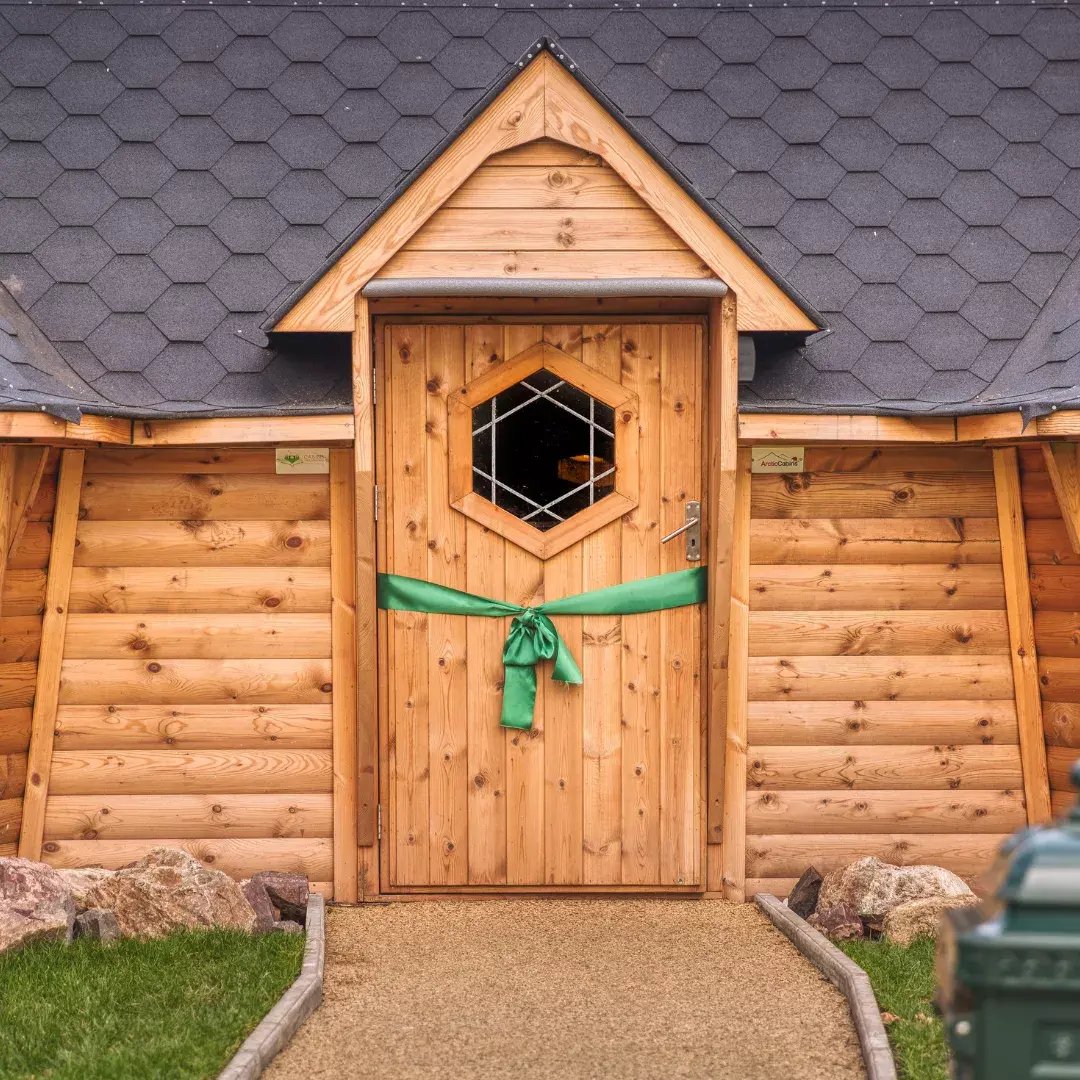 cabin with green ribbon