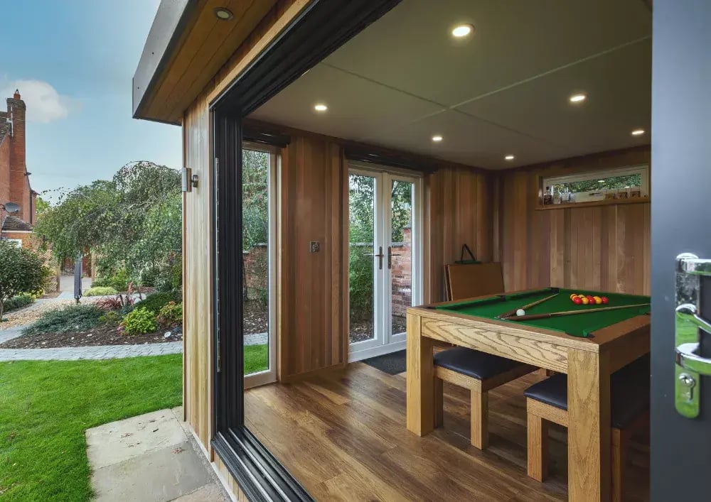 looking inside a garden bar through open bifolds
