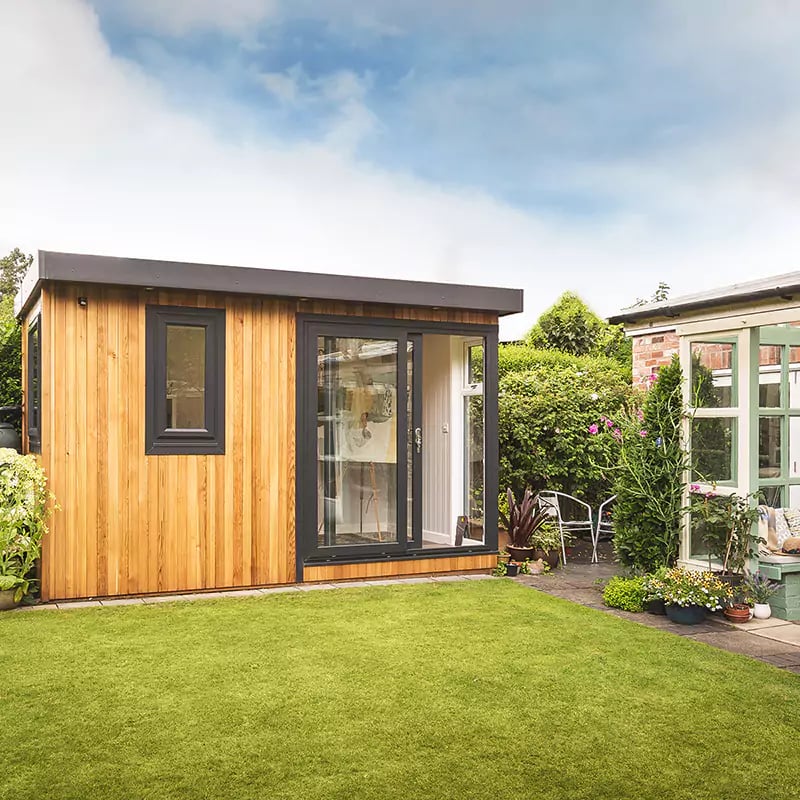 external shot of a small garden artists studio