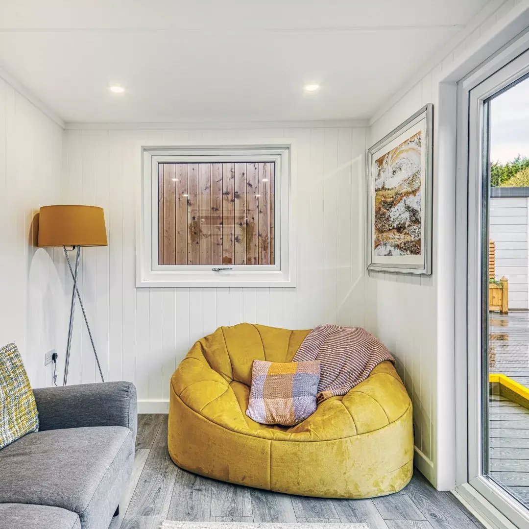 interior of a garden room with sofas