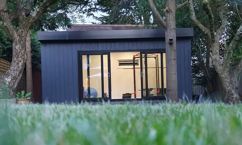 Large black zero maintenance garden room