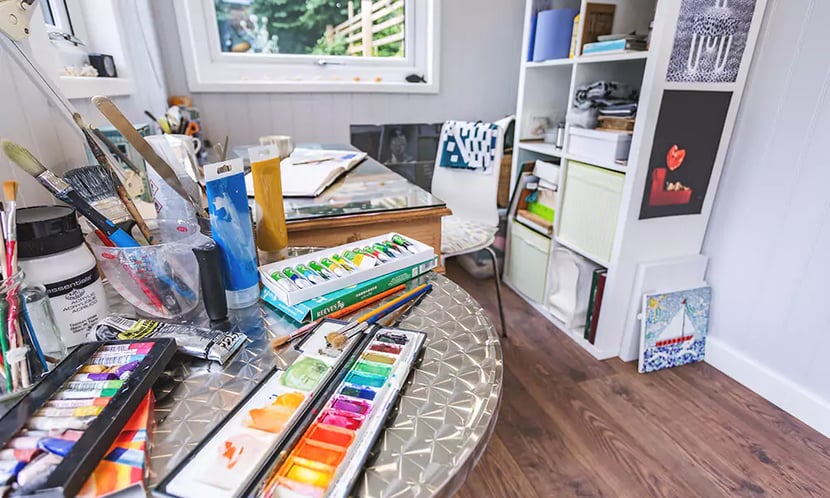 garden room art studio with paints 