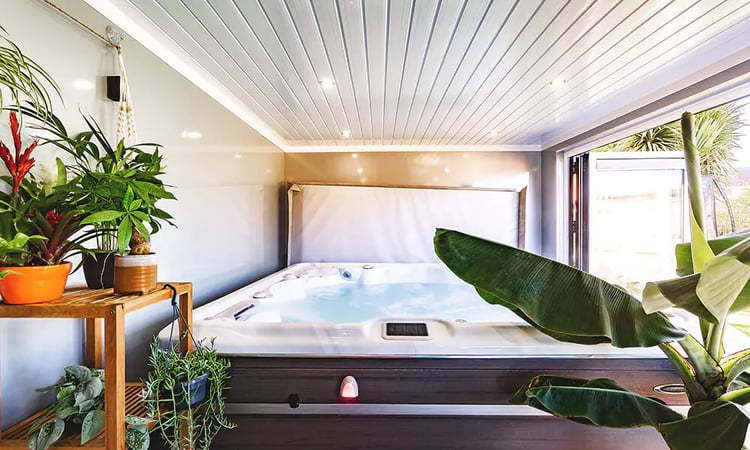 Hot Tub Garden Room with green plants