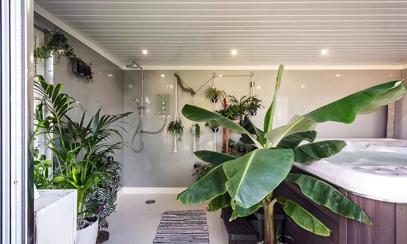 hot tub garden room with plants