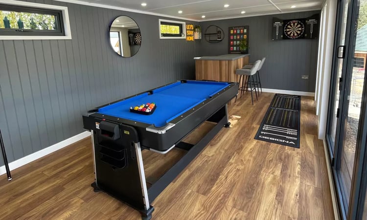 cabin master garden room man cave with pool table and bar