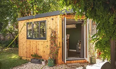 Corner timber garden room with insulation