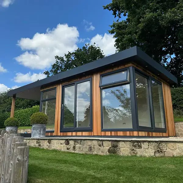 insulated garden cabin with veranda