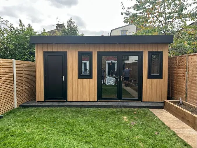 knot wood garden room with shed