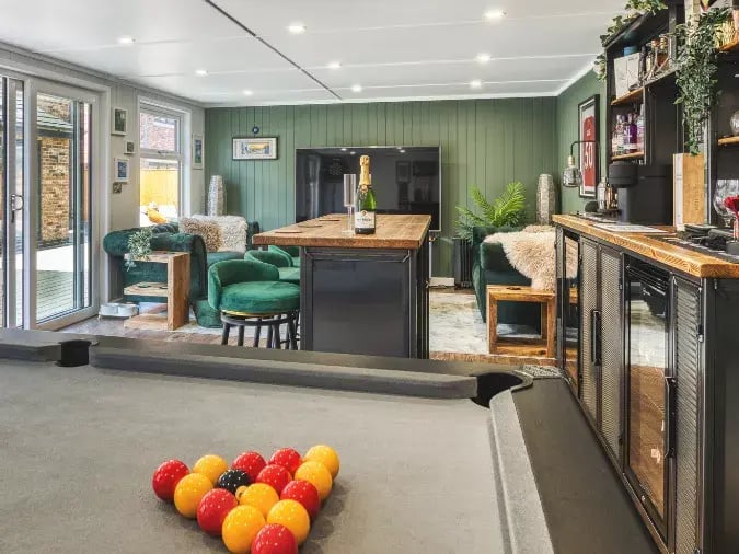 inside a garden bar with pool table