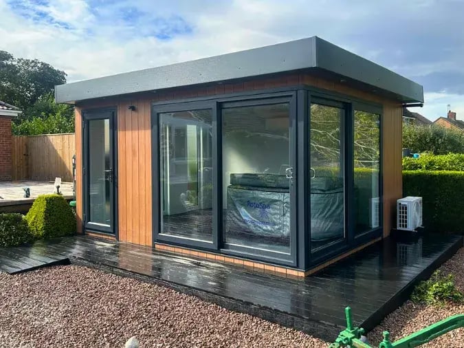 composite garden room in new build garden