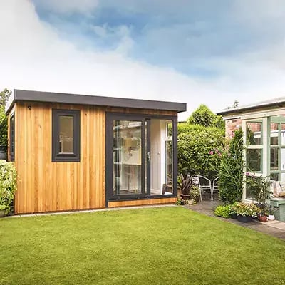 Small Garden Building with Micro Office and potted plant 