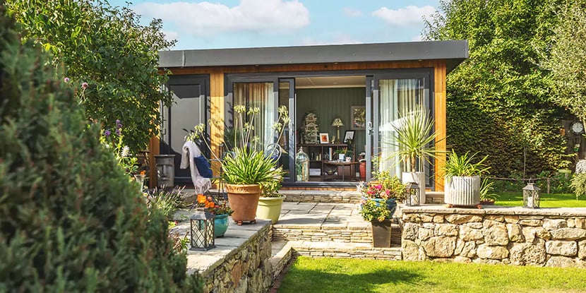 Luxury insulated cedar garden room with sliding doors open