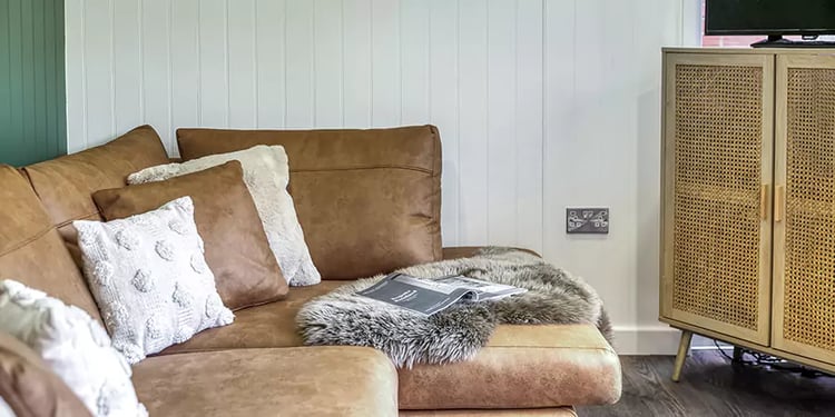 inside a cosy garden room lounge