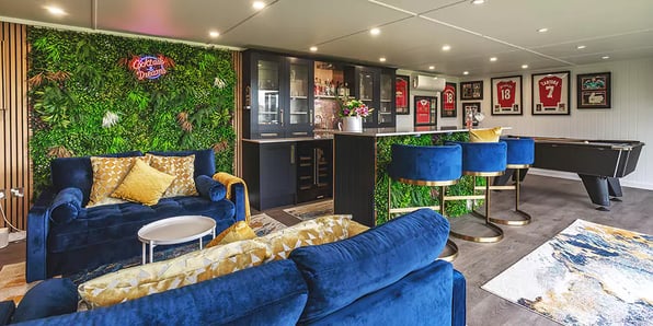 Interior of a garden bar games room for entertaining, with pool table and seating