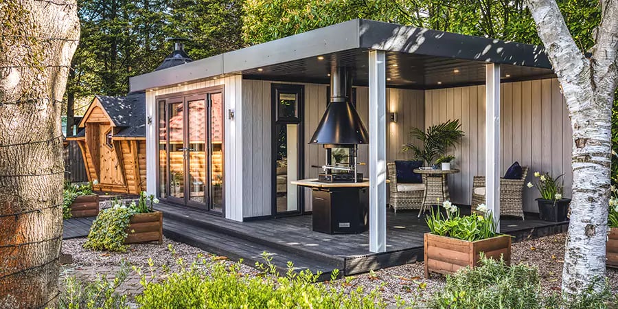 Building with veranda and BBQ Grill
