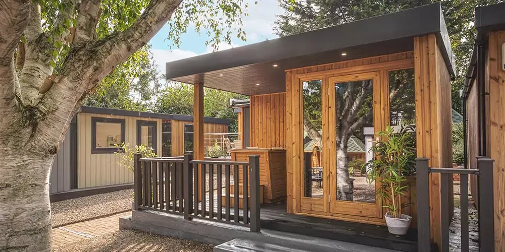garden sauna cabin with veranda and cold plunge