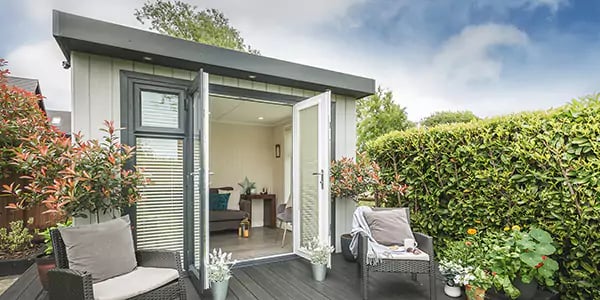 small garden room on decking