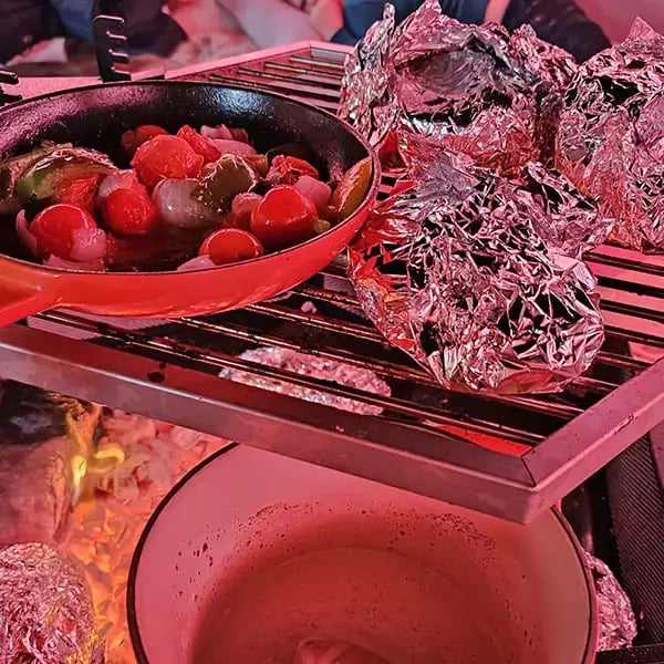 BBQ food on grill inside BBQ hut