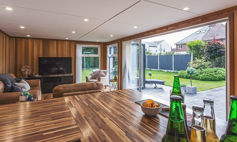 Interior of a cedar clad pub shed with bar