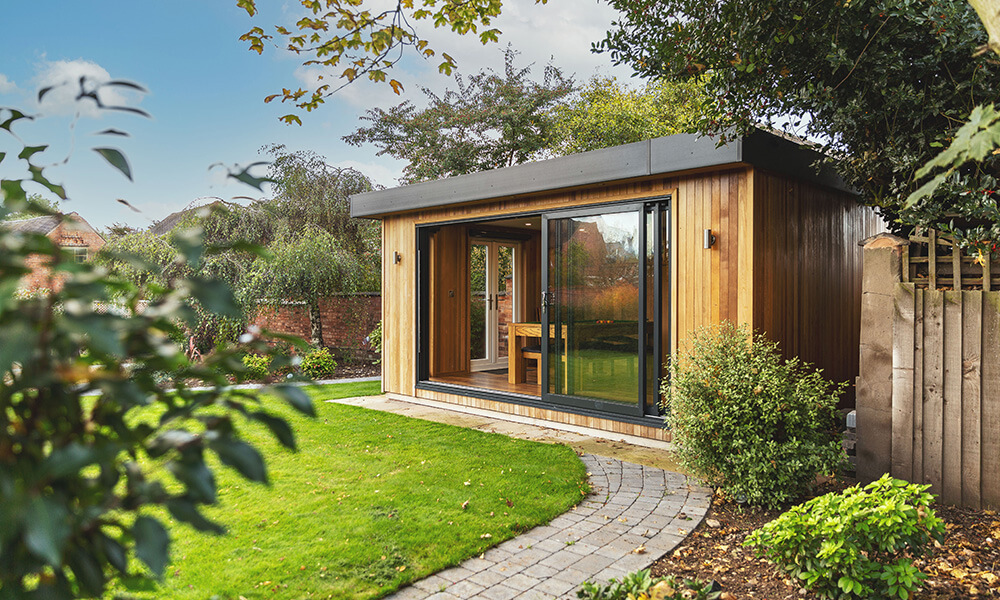 Small insulated garden bar with sliding doors