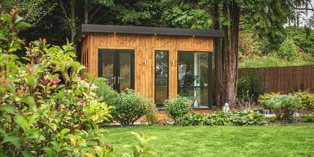 Small garden room office in redwood timber