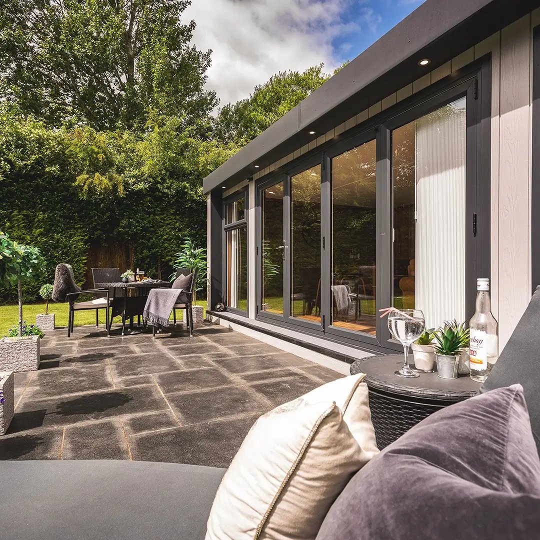 garden room with bi-fold doors on a sunny day